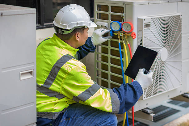 Professional Air Duct Cleaning technician working in Princeville, IL